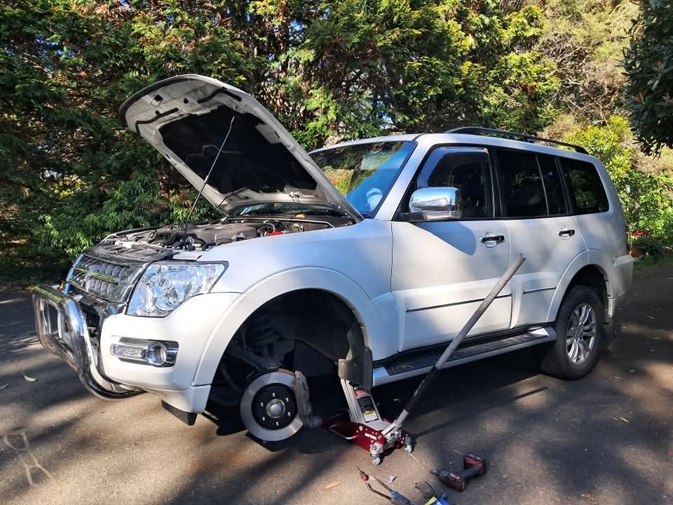 White SUV roadworthy inspection
